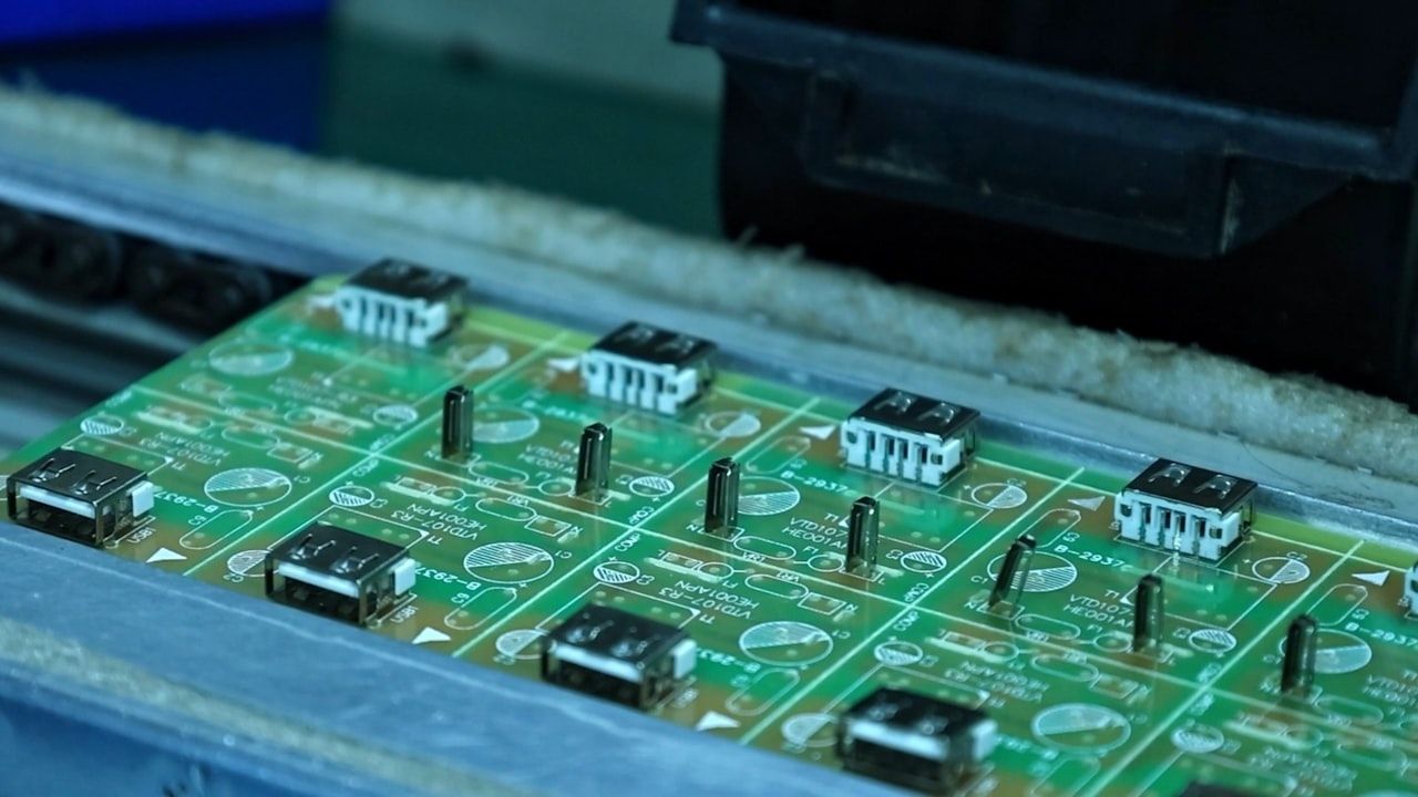 Panelised circuit boards on a production line